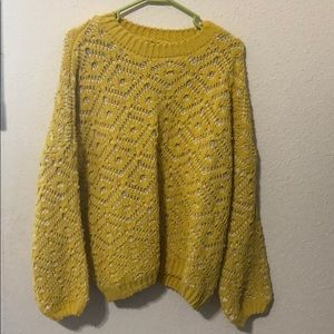 Yellow knitted sweater